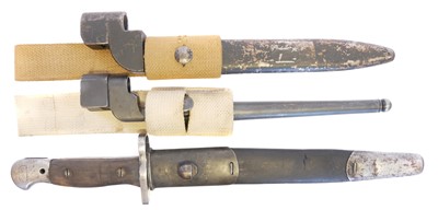 Lot 225 - Two Lee Enfield No.4 bayonets, including a...