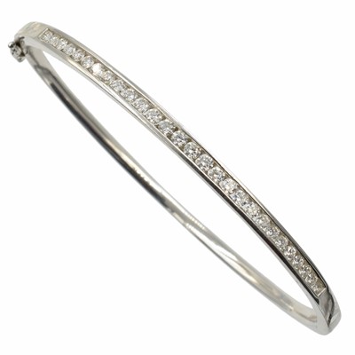 Lot An 18ct white gold and diamond bangle