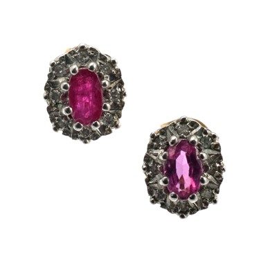 Lot A pair of 9ct cluster earrings