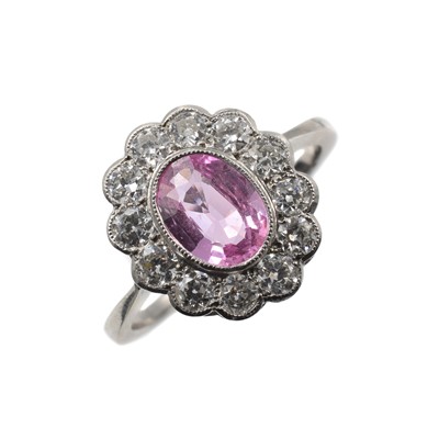 Lot 236 - A pink sapphire and diamond cluster ring
