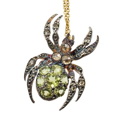 Lot 213 - A diamond and peridot spider pendant