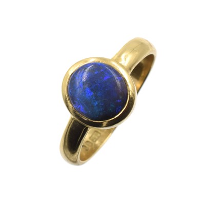 Lot An 18ct yellow gold natural Australian blue/black opal ring