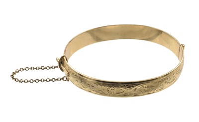 Lot A yellow metal gold bangle