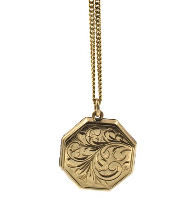Lot A yellow metal locket pendant on chain