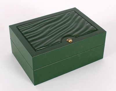 Lot 21 - An empty green leather Rolex watch box and outer card box (2).