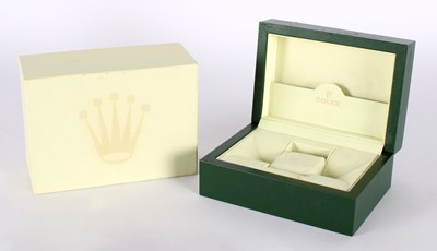 Lot 21 - An empty green leather Rolex watch box and outer card box (2).