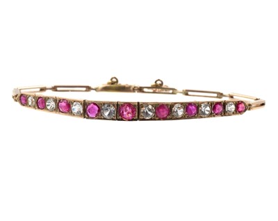 Lot 139 - An Art Deco-style ruby and white sapphire panel bracelet