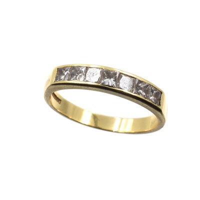 Lot 93 - A 18ct yellow gold and diamond half-eternity ring