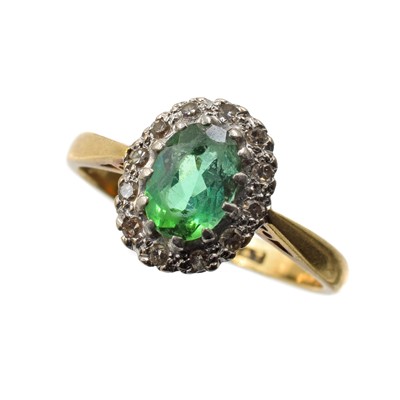Lot 254 - A yellow metal tourmaline and diamond cluster ring