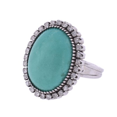 Lot 125 - A white metal turquoise and diamond cocktail ring