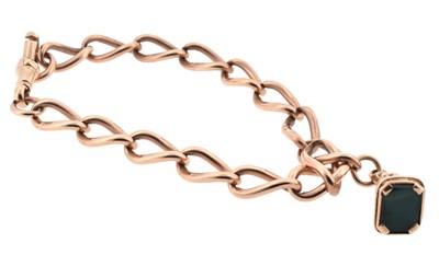Lot 178 - An early 20th-century 9ct rose gold curb link bracelet with fob seal