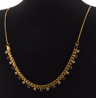 Lot 207 - A yellow metal necklace