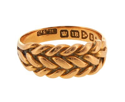 Lot 241 - An 18ct yellow gold ring