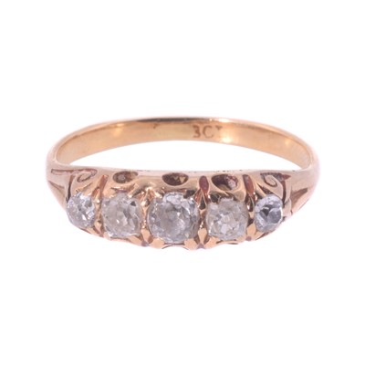 Lot 224 - An 18ct yellow gold five-stone diamond ring