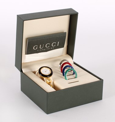 Lot 22 - A Gucci ladies 'Chameleon' gold plated quartz wristwatch set