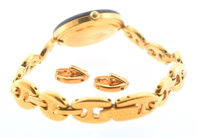 Lot 22 - A Gucci ladies 'Chameleon' gold plated quartz wristwatch set