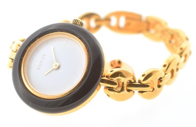 Lot 22 - A Gucci ladies 'Chameleon' gold plated quartz wristwatch set