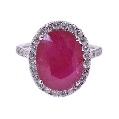 Lot 16 - A platinum ruby and diamond cluster ring