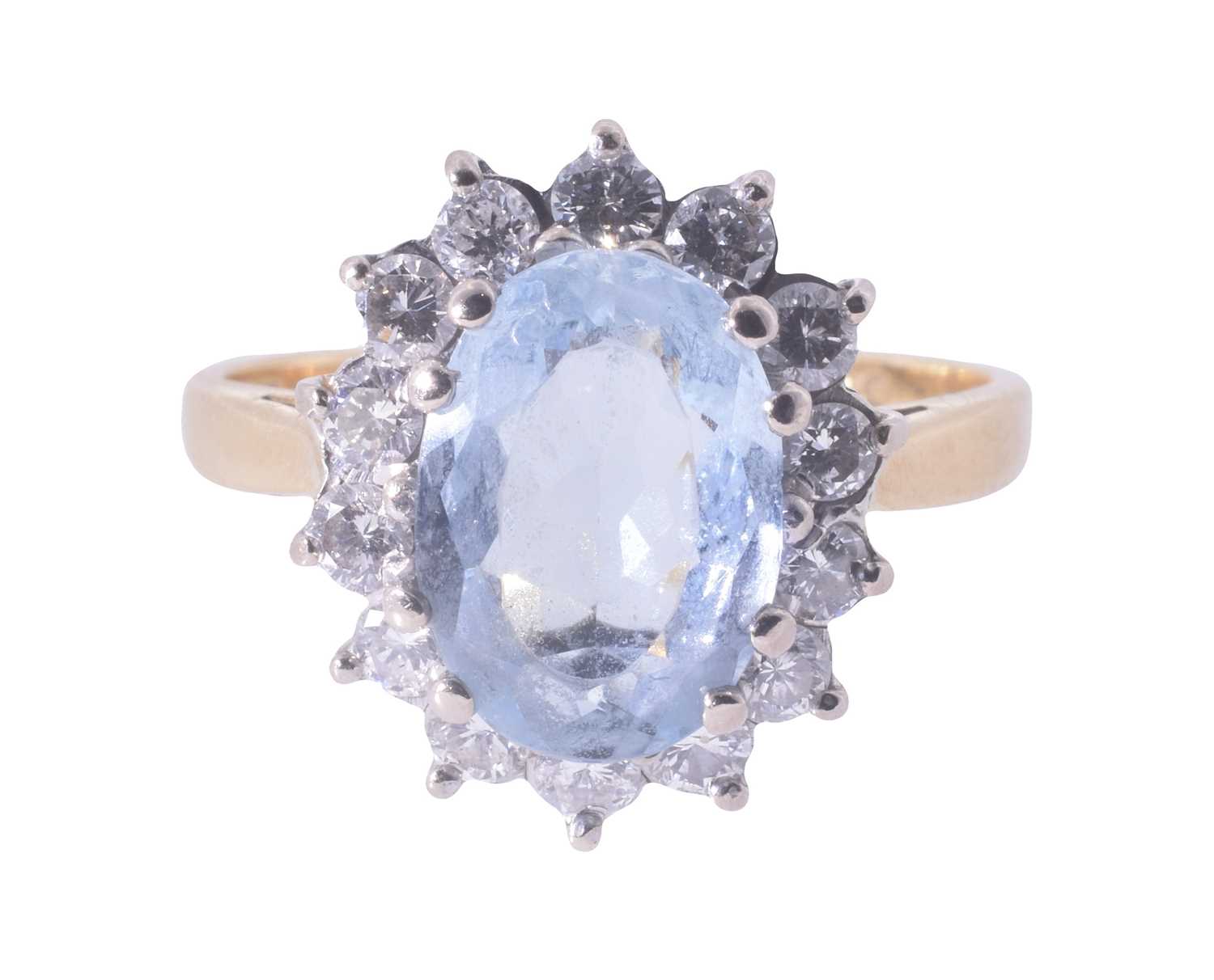 Lot 28 - An 18ct yellow gold aquamarine and diamond ring