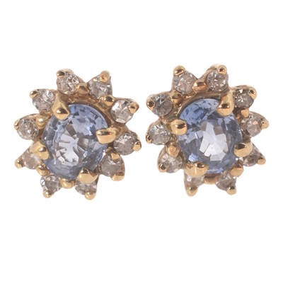 Lot 113 - A pair of 9ct aquamarine and diamond cluster earrings