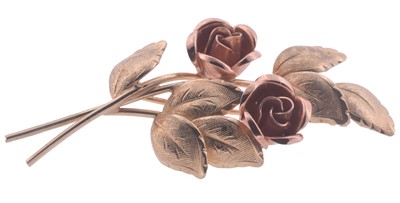 Lot 138 - A 9ct yellow and rose gold floral brooch