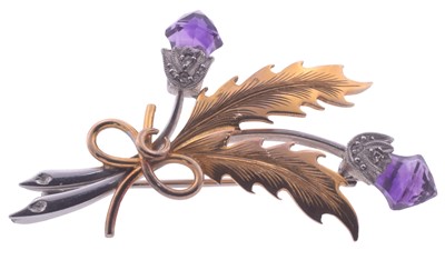 Lot 201 - A yellow and white metal brooch