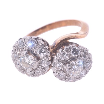 Lot 171 - An 18ct rose gold toi et moi diamond ring