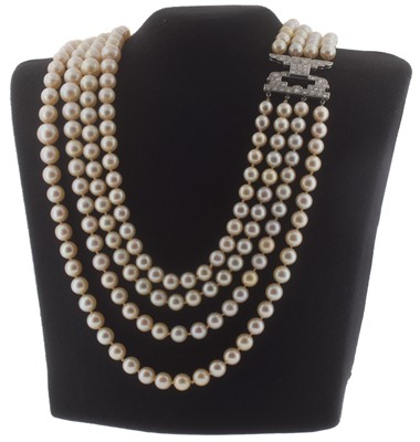 Lot 46 - A four-row cultured pearl and diamond necklace