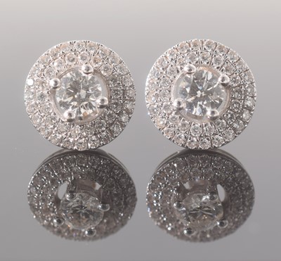 Lot 231 - A pair of 18ct diamond earrings
