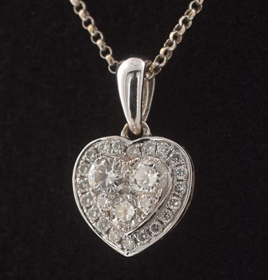 Lot 250 - An 18ct white gold diamond heart pendant necklace