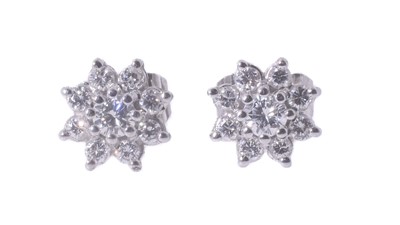 Lot 111 - A pair of 18ct white gold diamond cluster earrings