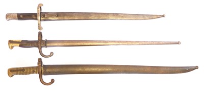 Lot Three bayonets and scabbards, to fit rifles: M....
