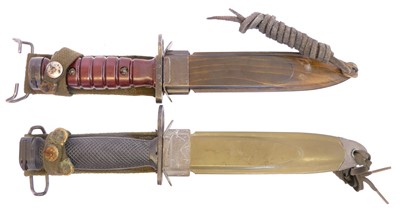 Lot Two US bayonets and scabbards, including an M8...