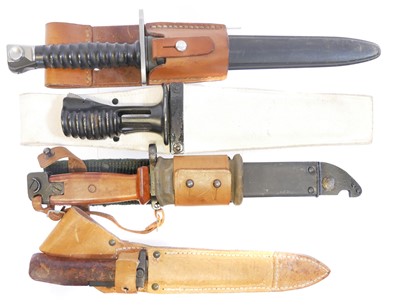 Lot Four bayonets and scabbards, to include an...