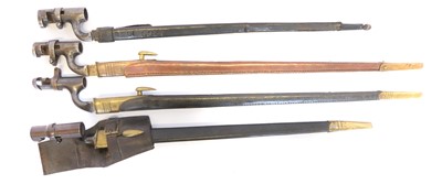 Lot Four socket bayonets and scabbards, one with...