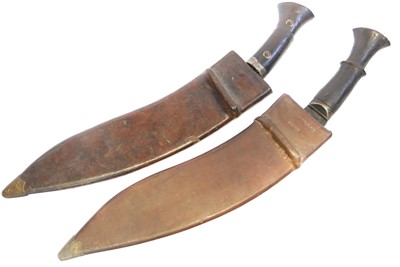 Lot Two Kukris and scabbards, with 13inch blades,...