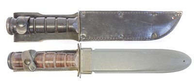 Lot Two US M3 type combat knives and scabbards,...