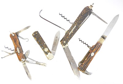 Lot Four horn gripped folding knife / combination...