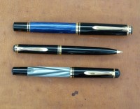 Lot 53 - Pelikan three ball point pens.