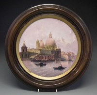 Lot 219 - Circular plaque by J.E. Dean.