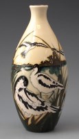 Lot 253 - Moorcroft avocet vase boxed.