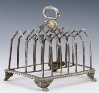 Lot 297 - George IV silver toast rack.
