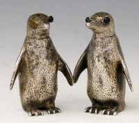 Lot 305 - Silver penguin cruet set.