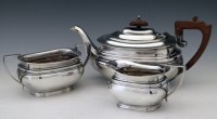 Lot 314 - Silver three piece tea service.