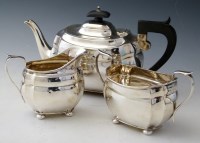 Lot 316 - Silver three piece tea set.