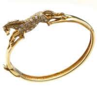 Lot 337 - Horse bangle 9ct gold.