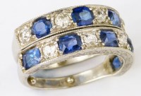 Lot 354 - Pair of sapphire and diamond platinum