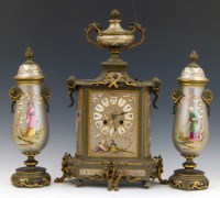 Lot 607 - 19th century French three piece clock garnature.