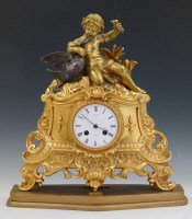 Lot 611 - Gilt mantel clock.