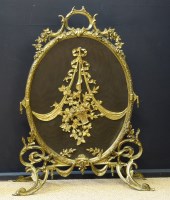Lot 626 - Gilt metal fire guard.